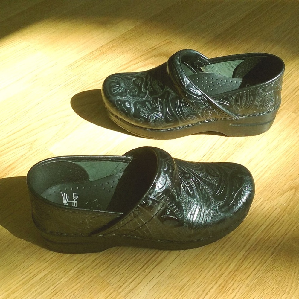 dansko black tooled leather clogs